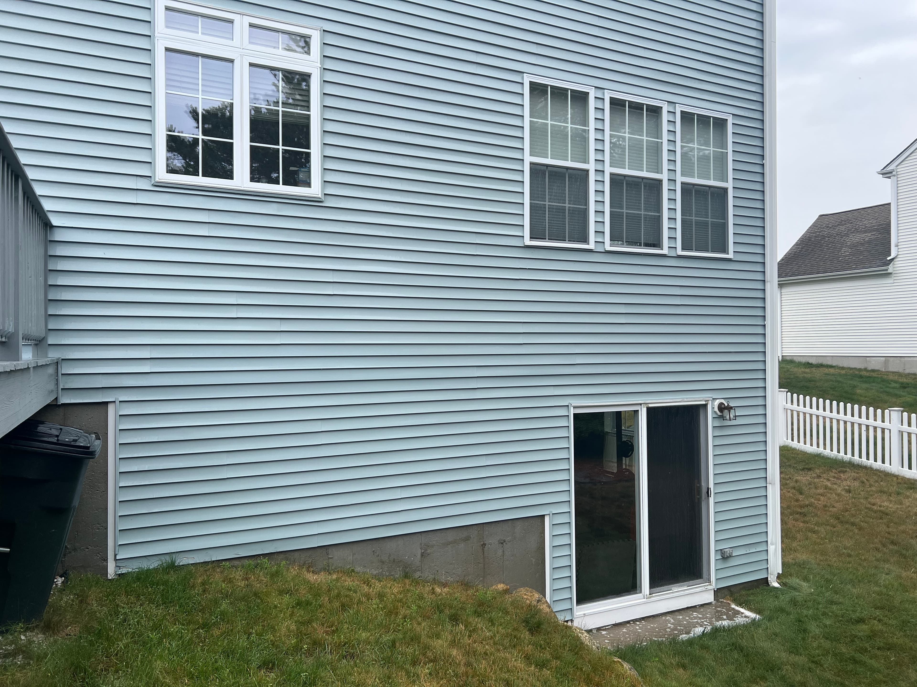 Clean vinyl siding after soft washing by Graham Power Washing in Plymouth MA